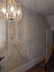 Original wallpaper in late 1800s farmhouse stairway in Dundas Ontario