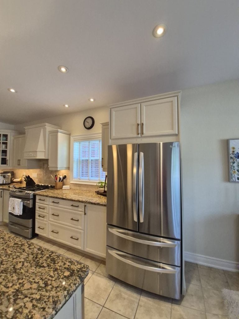 After photo of professionally refinished kitchen cabinets in Ancaster by DW Painting & Wallpapering Inc.
